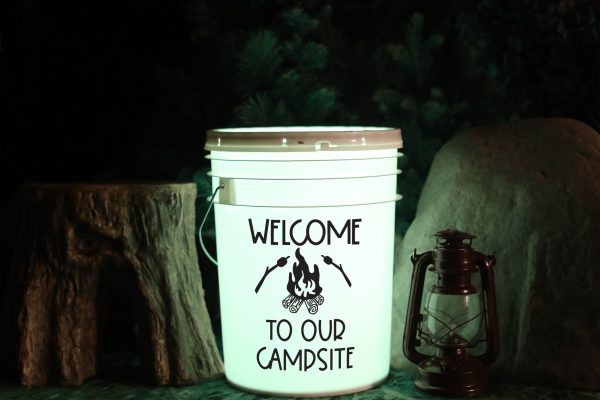 camping bucket with light saying welcome to our campsite